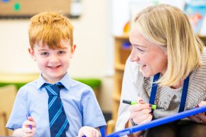 Pupil receiving support at Holme Grange School