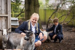 Pupils exploring the school farm at Holme Grange School